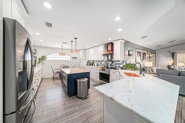 Dining room, Interior, Kitchen, Living room, Pendant Lights, Recessed Lighting, Stainless Steel Appliances, Wood Texture Flooring