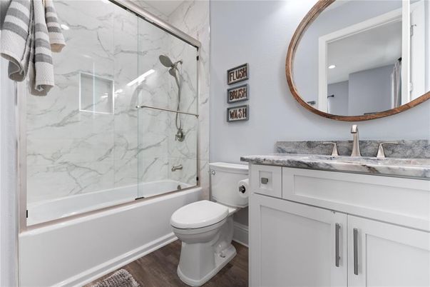 Bathroom, Glass Shower, Interior, Marble Walls, Recessed Lighting, Wood Texture Flooring
