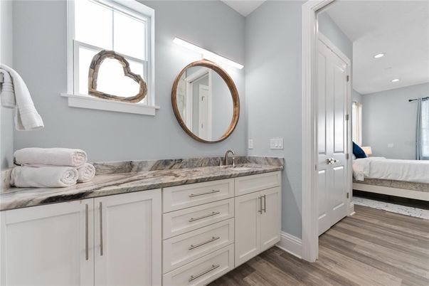 Bathroom, Bedroom, Dual Sink Vanities, Interior, Recessed Lighting, Wood Texture Flooring
