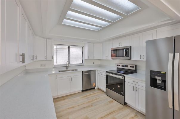 Interior, Kitchen, Recessed Lighting, Stainless Steel Appliances, Wood Texture Flooring