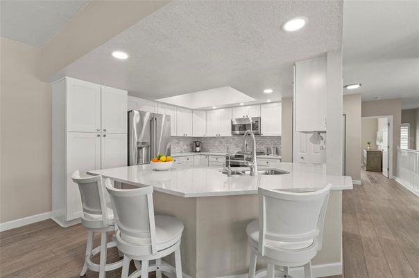 Interior, Kitchen, Recessed Lighting, Stainless Steel Appliances, Wood Texture Flooring