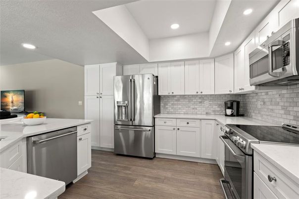 Interior, Kitchen, Recessed Lighting, Stainless Steel Appliances, Wood Texture Flooring