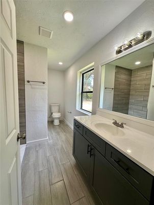 Bathroom, Dual Sink Vanities, Interior, Recessed Lighting, Wood Texture Flooring