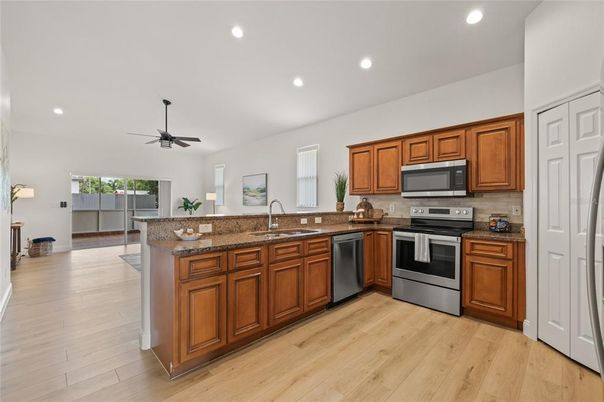 Interior, Kitchen, Recessed Lighting, Stainless Steel Appliances, Wood Texture Flooring