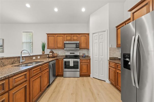 Interior, Kitchen, Recessed Lighting, Stainless Steel Appliances, Wood Texture Flooring