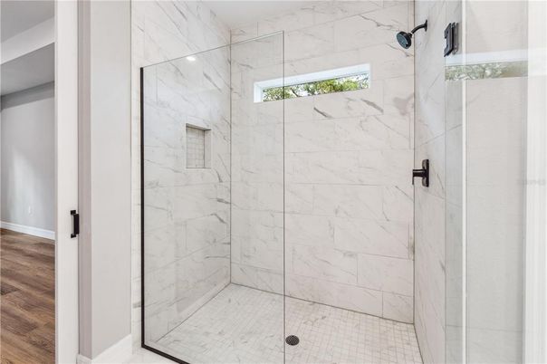 Bathroom, Glass Shower, Interior, Marble Walls, Wood Texture Flooring