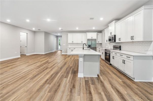 Interior, Kitchen, Recessed Lighting, Stainless Steel Appliances, Wood Texture Flooring