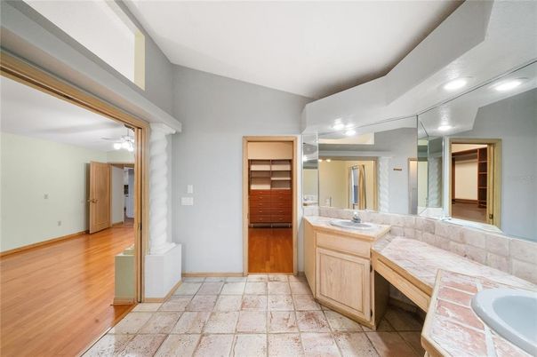 Bathroom, Dual Sink Vanities, Interior, Recessed Lighting, Wood Texture Flooring