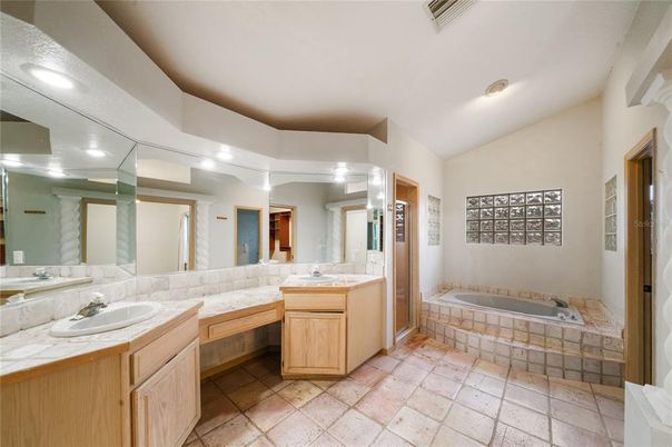 Bathroom, Dual Sink Vanities, Interior, Recessed Lighting, Tile Countertops