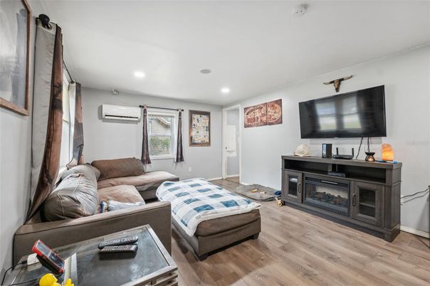 Fireplace, Interior, Living room, Recessed Lighting, Wood Texture Flooring