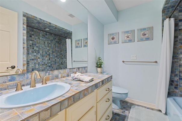 Bathroom, Dual Sink Vanities, Interior, Recessed Lighting, Tile Countertops