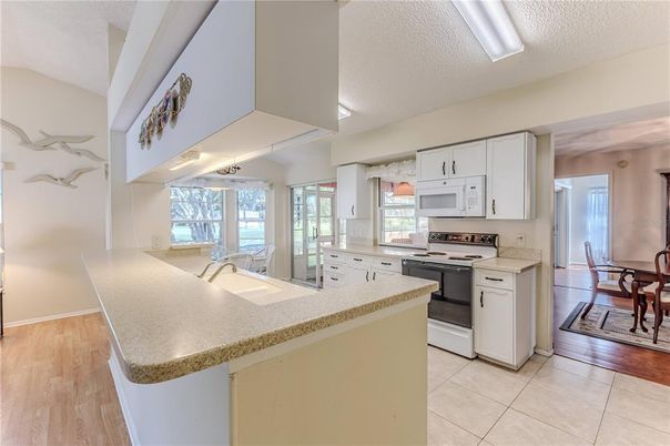 Dining room, Interior, Kitchen, Stainless Steel Appliances, Wood Texture Flooring