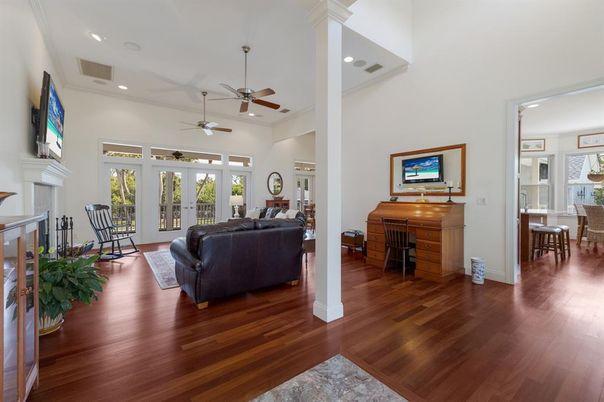 Dining room, Fireplace, Interior, Living room, Recessed Lighting, Wood Texture Flooring
