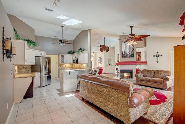 Fireplace, Interior, Kitchen, Living room, Recessed Lighting, Stainless Steel Appliances