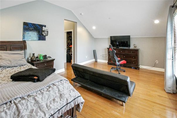 Bedroom, Fitness Equipment, Interior, Recessed Lighting, Wood Texture Flooring