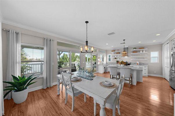Dining room, Interior, Kitchen, Pendant Lights, Recessed Lighting, Stainless Steel Appliances, Wood Texture Flooring