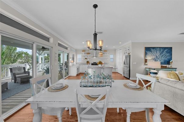 Dining room, Interior, Kitchen, Living room, Pendant Lights, Recessed Lighting, Stainless Steel Appliances, Wood Texture Flooring