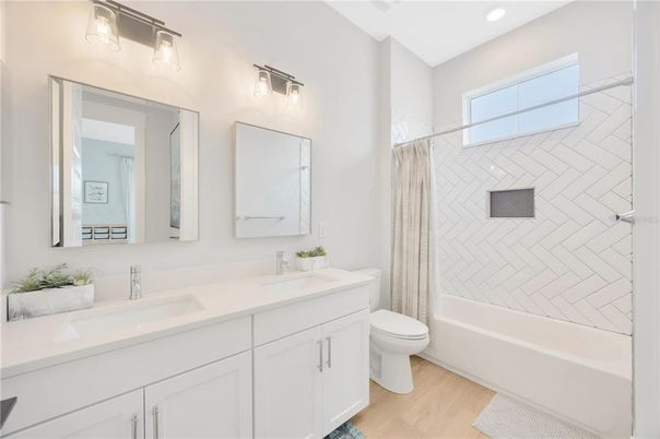 Bathroom, Dual Sink Vanities, Interior, Recessed Lighting, Wood Texture Flooring