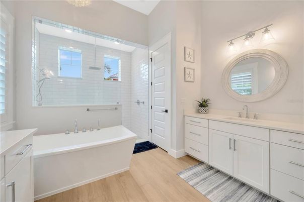Bathroom, Dual Sink Vanities, Free Standing Baths, Interior, Wood Texture Flooring