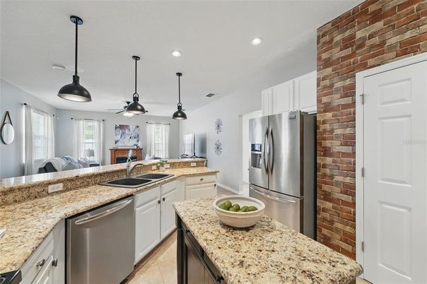 Interior, Kitchen, Pendant Lights, Recessed Lighting, Stainless Steel Appliances, Stone Walls