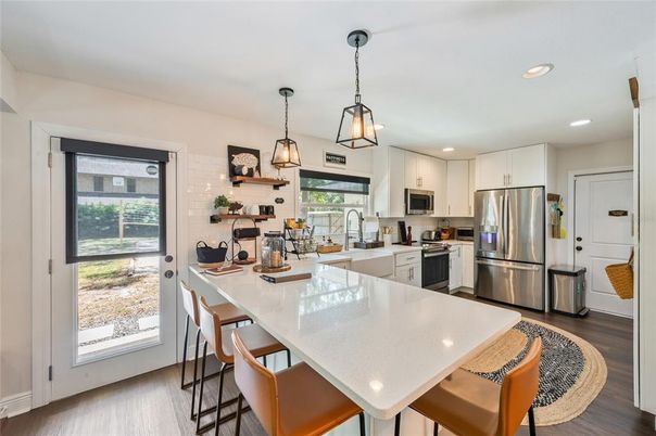Interior, Kitchen, Pendant Lights, Recessed Lighting, Stainless Steel Appliances, Wood Texture Flooring