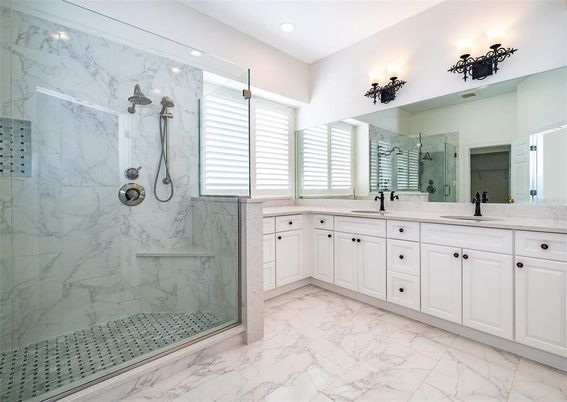 Bathroom, Dual Sink Vanities, Glass Shower, Interior, Marble, Marble Walls, Recessed Lighting