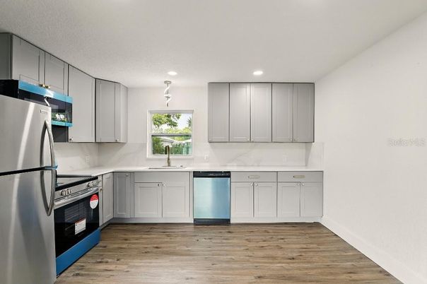 Interior, Kitchen, Recessed Lighting, Stainless Steel Appliances, Wood Texture Flooring