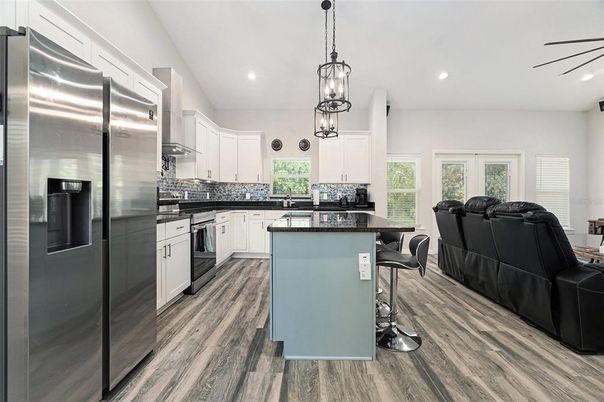 Interior, Kitchen, Pendant Lights, Recessed Lighting, Stainless Steel Appliances, Wood Texture Flooring