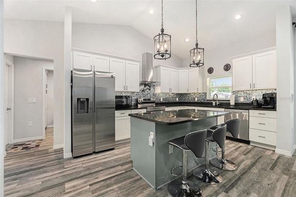 Interior, Kitchen, Pendant Lights, Recessed Lighting, Stainless Steel Appliances, Wood Texture Flooring