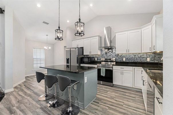 Interior, Kitchen, Pendant Lights, Recessed Lighting, Stainless Steel Appliances, Wood Texture Flooring