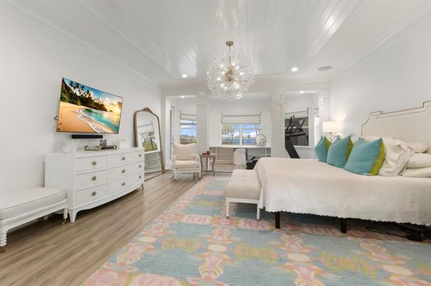 Bedroom, Chandelier, Fitness Equipment, Interior, Recessed Lighting, Wood Texture Flooring