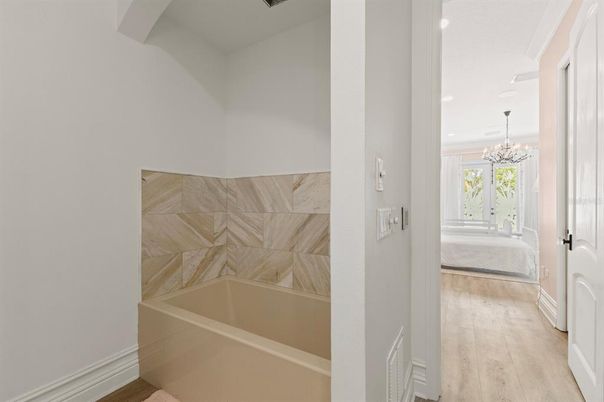Bathroom, Chandelier, Interior, Marble Walls, Recessed Lighting, Wood Texture Flooring