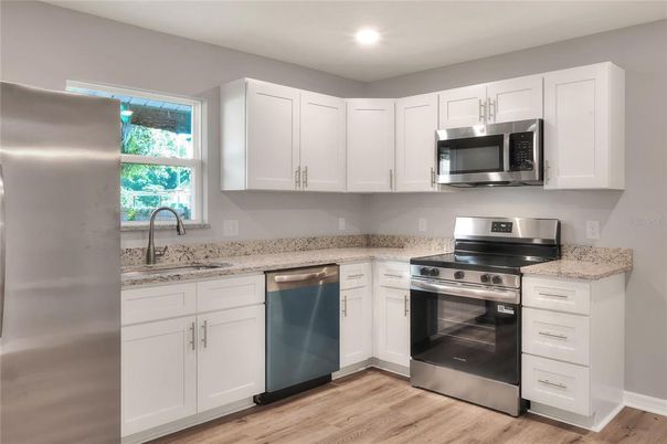 Interior, Kitchen, Recessed Lighting, Stainless Steel Appliances, Wood Texture Flooring