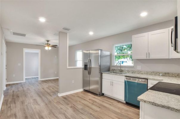 Interior, Kitchen, Recessed Lighting, Stainless Steel Appliances, Wood Texture Flooring