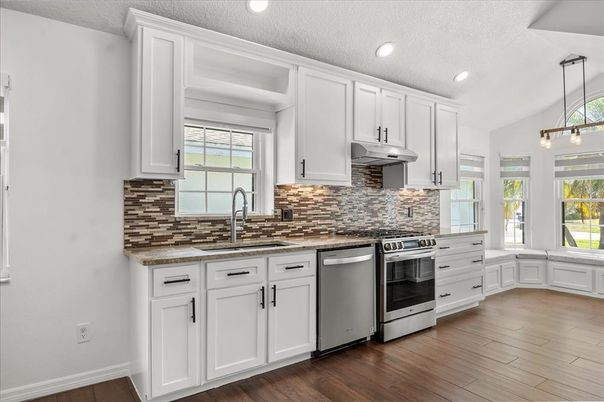 Interior, Kitchen, Pendant Lights, Recessed Lighting, Stainless Steel Appliances, Wood Texture Flooring