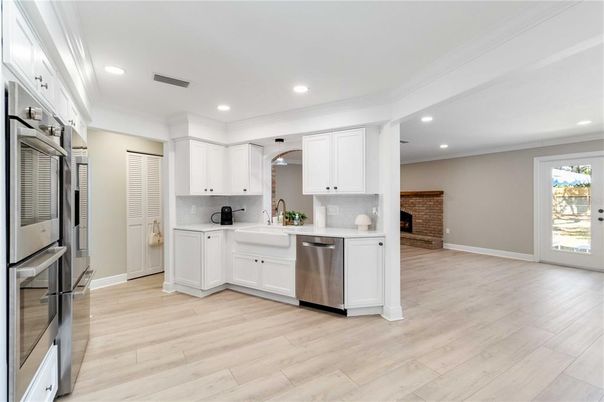 Interior, Kitchen, Recessed Lighting, Stainless Steel Appliances, Wood Texture Flooring