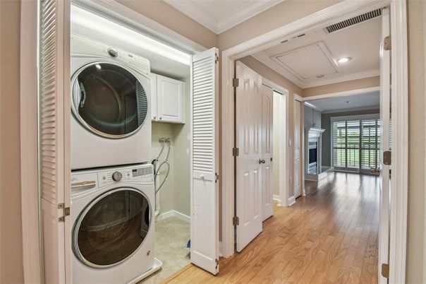Fireplace, Interior, Recessed Lighting, Utility Closets, Washer, Wood Texture Flooring