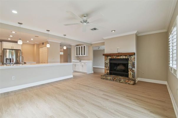 Fireplace, Interior, Kitchen, Pendant Lights, Recessed Lighting, Stainless Steel Appliances, Wood Texture Flooring
