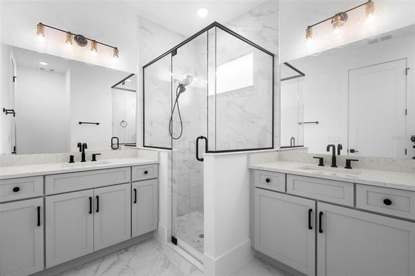 Bathroom, Dual Sink Vanities, Glass Shower, Interior, Marble, Marble Walls, Recessed Lighting
