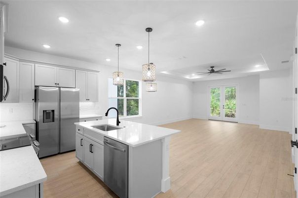 Interior, Kitchen, Pendant Lights, Recessed Lighting, Stainless Steel Appliances, Wood Texture Flooring