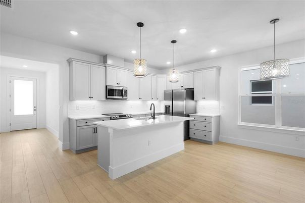 Interior, Kitchen, Pendant Lights, Recessed Lighting, Stainless Steel Appliances, Wood Texture Flooring