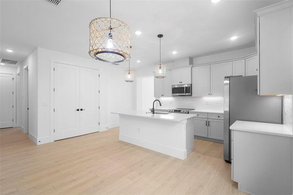 Interior, Kitchen, Pendant Lights, Recessed Lighting, Stainless Steel Appliances, Wood Texture Flooring