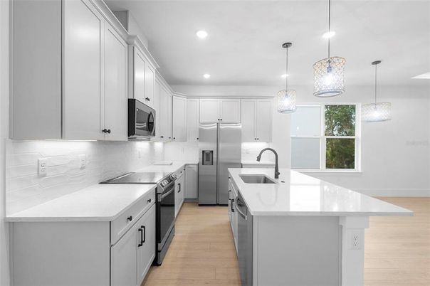Interior, Kitchen, Pendant Lights, Recessed Lighting, Stainless Steel Appliances, Wood Texture Flooring