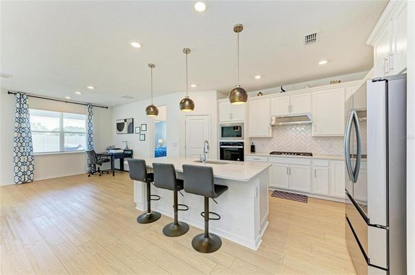 Interior, Kitchen, Pendant Lights, Recessed Lighting, Stainless Steel Appliances, Wood Texture Flooring
