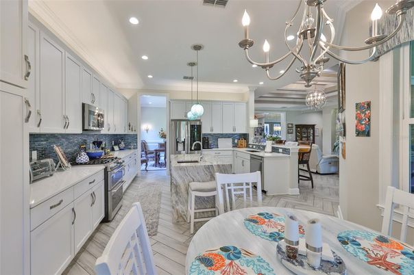 Chandelier, Dining room, Interior, Kitchen, Pendant Lights, Recessed Lighting, Stainless Steel Appliances