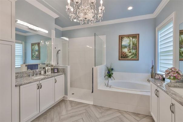 Bathroom, Chandelier, Glass Shower, Interior, Recessed Lighting, Wood Texture Flooring