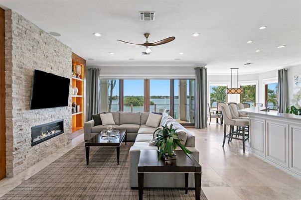 Dining room, Fireplace, Interior, Living room, Pendant Lights, Recessed Lighting, Stone Walls, Water