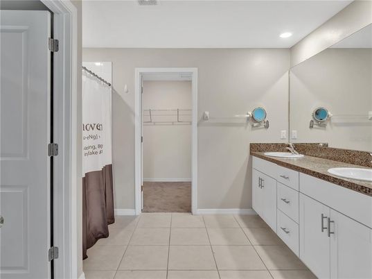 Bathroom, Dual Sink Vanities, Interior, Recessed Lighting, Walk-in Closets