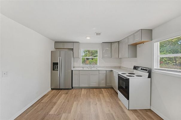Interior, Kitchen, Recessed Lighting, Stainless Steel Appliances, Wood Texture Flooring