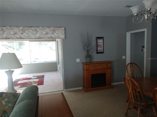 Chandelier, Dining room, Fireplace, Interior